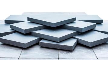 Stacked gray tiles arranged in a geometric pattern on a white background showcasing modern design photo