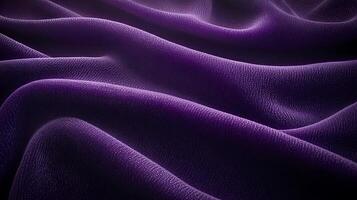 Close-up of elegant purple fabric waves showcasing texture and depth in soft lighting photo