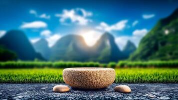 Serene landscape with a stone arrangement in the foreground and mountains under a bright sky photo