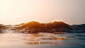 Serene sunset over gentle ocean waves with golden reflections and a tranquil atmosphere photo