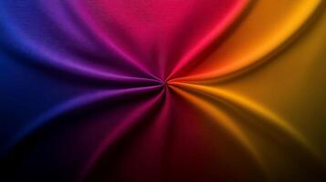 Vibrant swirl of colorful fabric showcasing a dynamic blend of purple, pink, and yellow hues photo
