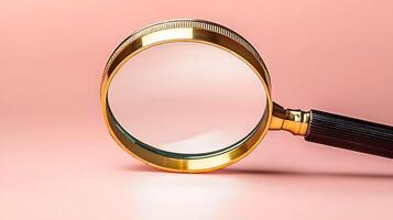Magnifying glass rests on a soft pink background, emphasizing clarity and focus in exploration photo