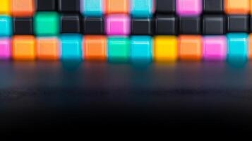 Colorful geometric blocks arranged in a vibrant pattern against a dark background, creating an abstract scene photo