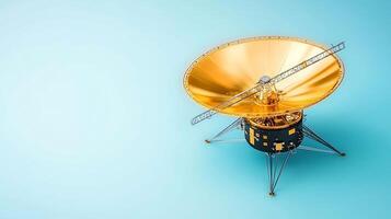 A detailed view of a golden satellite dish on a spacecraft against a light blue background photo