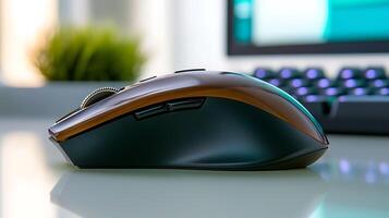 Close-up of a sleek gaming mouse on a desk with a blurred computer setup in the background photo