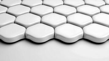 Close-up view of interlocking white hexagonal tiles arranged in a seamless pattern on a surface photo