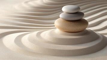 Stack of zen pebbles balancing on smooth sand creating concentric circles photo