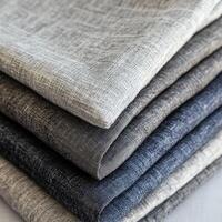 Linen fabric collection showcasing various shades and textures photo