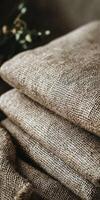 Linen fabric folded neatly on a wooden surface photo