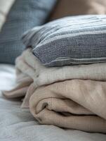 Soft linen fabric draped elegantly on a bed photo