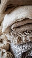 Linen fabric neatly stacked in soft neutral tones photo