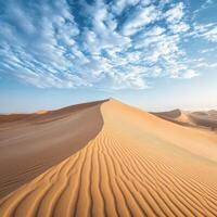 Scenic view of dunes under a blue sky in the desert photo