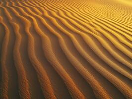 Patterns in the golden sand of a vast desert landscape photo