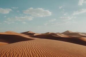 The desert is full of sand dunes and clouds photo