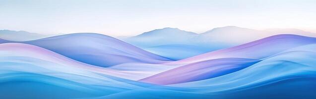 A blue and purple landscape with mountains in the background photo