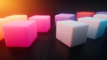 Colorful glowing cubes arranged on a dark wooden surface with a soft light gradient in the background photo