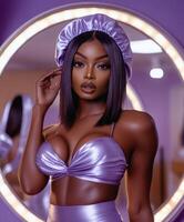Elegant model wearing silk bonnet and satin outfit in modern setting photo