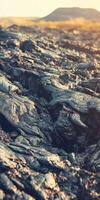 Lava flow crust showcasing texture and formations from an active vulcano photo