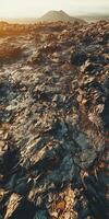 Breathtaking view of volcanic landscape with rugged terrain at sunset photo