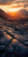 A sunset over a lava field photo