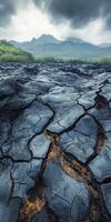 Caldera landscape with cracked lava fields under cloudy skies in a volcanic region photo