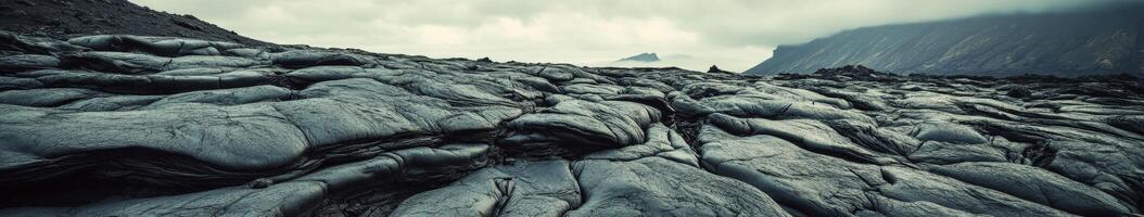 Landscape of hardened lava flow from an ancient volcano in Iceland photo