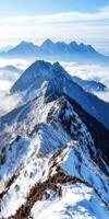 Majestic snowy mountain peaks in daylight photo