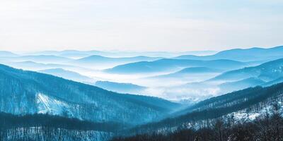 Winter mountains under a blue sky view photo