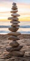 Balanced stones create art by the beach photo