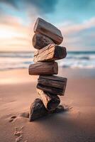 Stacked wooden logs near the ocean shore photo