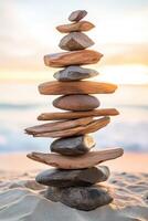 Natural balance of stones and wood at sunset photo