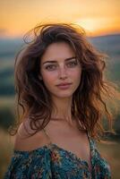 A beautiful woman with long hair in a field photo