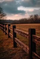 A fence in the middle of a field photo