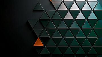 Abstract geometric pattern of dark and light triangles with an orange accent, creating visual interest photo
