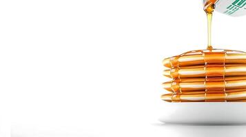 Stack of golden pancakes being drizzled with syrup on a white plate against a minimalistic background photo