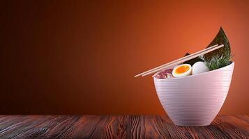 A beautifully arranged bowl of ramen with eggs and seaweed on a wooden table against a warm backdrop photo