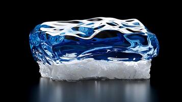 A crystal-clear ice block with blue accents, reflecting light against a dark background photo