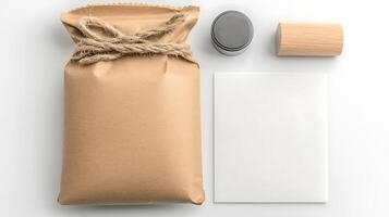 A neatly packaged brown paper parcel tied with twine, accompanied by a wooden cylinder and a blank sheet photo