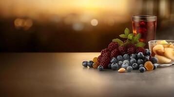Refreshing summer beverage with berries and snacks on a table against a sunset background photo