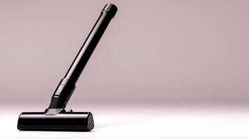 Sleek black vacuum cleaner nozzle positioned on a minimalist surface, showcasing modern design photo