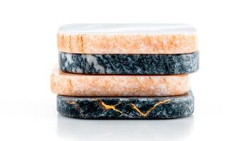 Stacked marble coasters showcasing elegant design and color variations against a white background photo