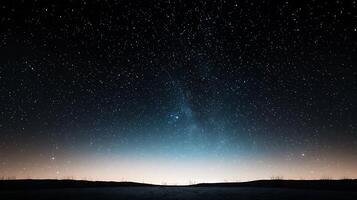 Starry night sky over a serene landscape with distant horizon and subtle gradient lighting photo