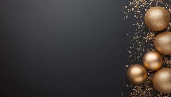 A festive arrangement of golden ornaments on a dark background. photo