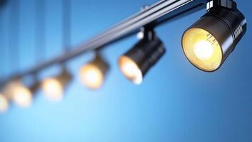 A group of spotlights on a blue background photo