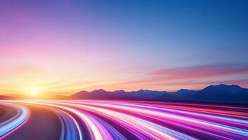 A vibrant sunset with light trails, suggesting speed and motion. photo