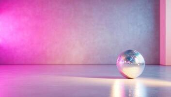 A reflective disco ball on a minimalist floor with colorful lighting. photo