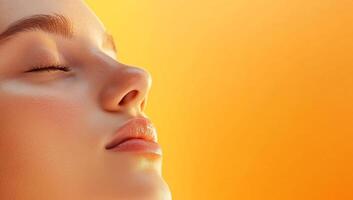 A woman with her eyes closed and her face open photo
