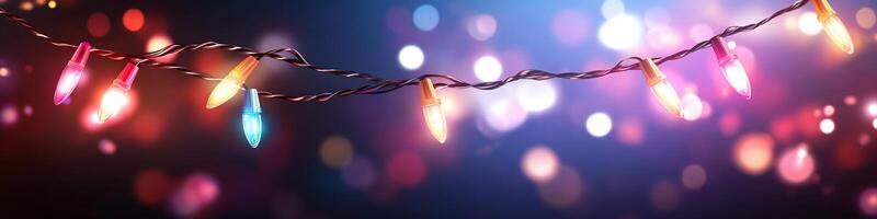 Colorful string lights against a blurred, vibrant background. photo