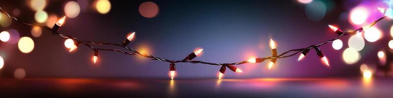 Colorful string lights against a blurred background for festive ambiance. photo