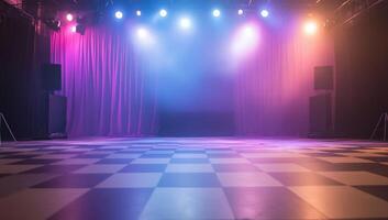 A stage with colorful lights and checkered flooring for performances. photo